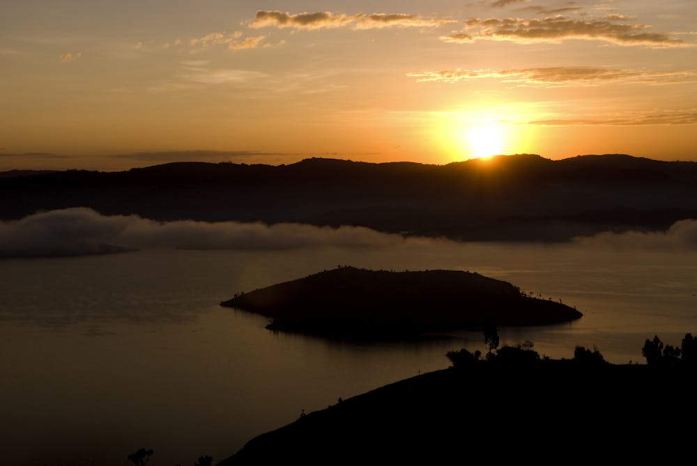 Sunrise over crater lake from Virunga Lodge, Rwanda