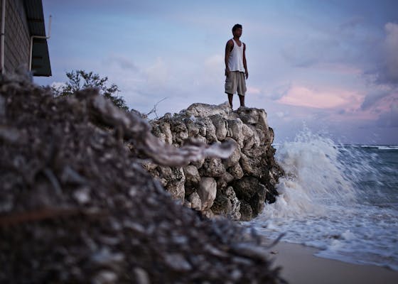 Building a man-made coral rock sea wall is the best defense man has against erosion and rising sea levels.
