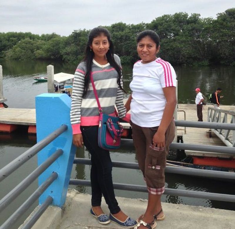 Mayra Lino (right) with the secretary of her family’s tourism company.